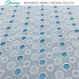 Kain cotton sulam putih